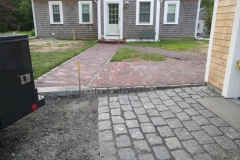 Brick walkway and permeable unilock paver apron